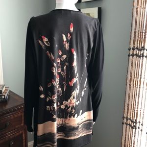 Open long black top with design of red/tan back